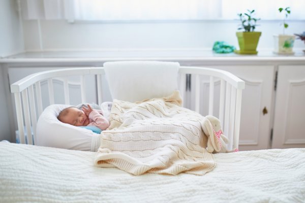 Baby sleeping in a crib